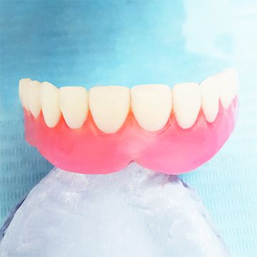 Протезы зубов без нёба